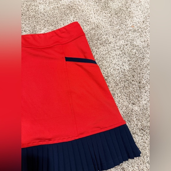 InPhorm NYC Kai Pleated tennis skort in poppy red and navy - Picture 11 of 11